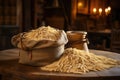 Sack of wheat and ears of wheat on a wooden background. Agricultural products concept