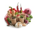 Sacking bags with various spices and vegetables on white background Royalty Free Stock Photo