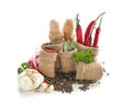 Sacking bags with various spices and vegetables on white background Royalty Free Stock Photo