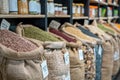 Sacks filled with colorful legumes beautifully displayed at a market, offering variety and healthful options