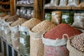 Sacks filled with colorful legumes beautifully displayed at a market, offering variety and healthful options