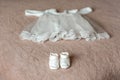 The sacrament of baptism. Baby clothes for the christening. Newborn baby during christening and chrismation