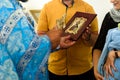 The sacrament of baptism. Orthodoxal Christening. Priest with ritual attributes Royalty Free Stock Photo