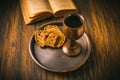 The sacrament of holy communion - bread, wine and bible Royalty Free Stock Photo