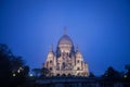 Sacre Coeur Basilica in Montmartre, Paris, illuminated during a winter night.