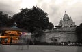 Sacre Coeur: monochrome Montmartre Fairground with a colourful carousel