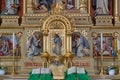 Sacred altar with wood carved Jesus Christ standing at the door