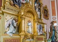 Sacred altar with wood carved Jesus Christ standing at the door