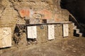 The Sacred Area. Reliefs. Herculaneum. Naples. Italy Royalty Free Stock Photo