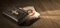 Sacred bible and Holy card with Jesus Christ image on a desk Royalty Free Stock Photo