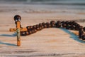 Sacred brown wooden rosary with jesus crucifix.