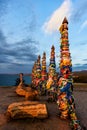 Sacred buryat place on Olkhon island with beautiful sky and clouds, lake Baikal, Russia