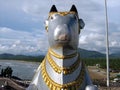 Sacred cow idol on beach Royalty Free Stock Photo