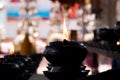 Sacred fire, coconut oil lamps in a buddhist temple