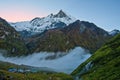 The Sacred Fishtail Mountian seen in the distance, sunrise, in Annapurna Range, Nepal Royalty Free Stock Photo