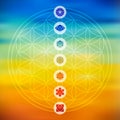 Sacred geometry with chakra icons colorful background