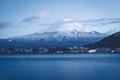 Sacred mountain of Fuji on top covered with snow in Japan. Royalty Free Stock Photo