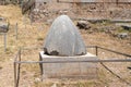 The Sacred Omphalos Stone, the center of the world in the archaeological site of Delphi in Fokida, Greece. Royalty Free Stock Photo