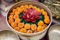Orange flowers in a bowl with lotus flower, Kathmandu, Nepal