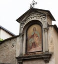 Sacred painting of the virgin Mary in the historic center of the small town of Lanzo