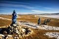 Sacred place with obo. Winter landscape of Mongolia. Lake Khubsugul and mountain