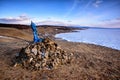 Sacred place with obo. Winter landscape of Mongolia. Lake Khubsugul