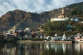 Sacred Rewalsar lake with big golden statue of Padmasambhava Royalty Free Stock Photo