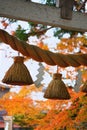 Sacred rope at the Japanese Shrine in the Autumn Season.