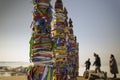 Sacred serge pillars near Shamanka, Cape Burkhan. Colorful Tibetan Buddhist ribbons tied to poles flutter in the wind