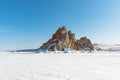 Sacred Shamanka Mountain on Olkhon Island in winter. View from the frozen Lake Baikal