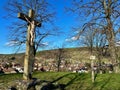 Sacred Silhouette: The Mission Cross of Kuppel Overlooking the Quiet Town of Buhl, Alsace Royalty Free Stock Photo