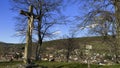 Sacred Silhouette: The Mission Cross of Kuppel Overlooking the Quiet Town of Buhl, Alsace Royalty Free Stock Photo