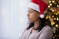 Upset biracial woman feel lonely on new year eve