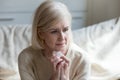 Sorrowful aged lady grieve for beloved husband