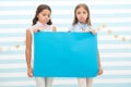 Sad announcement concept. Sorry for bad news. Girl hold advertising banner. Girls kids holding paper banner for Royalty Free Stock Photo