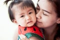 Sad asian baby girl crying and mother comforting her Royalty Free Stock Photo