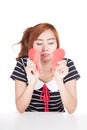 Sad Asian girl tear heart shape paper Royalty Free Stock Photo