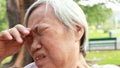 Sad asian senior woman crying and sitting alone,suffer depression problem,anxiety,feel hopeless,disappointed, elderly are crying s
