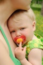 Sad baby with dummy Royalty Free Stock Photo