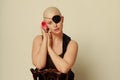 Sad bald girl with eye patch and Rose Royalty Free Stock Photo