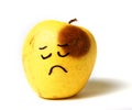 Sad beaten black eye fake apple Royalty Free Stock Photo