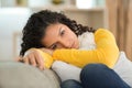 Sad beautiful girl on sofa Royalty Free Stock Photo