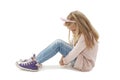 Sad beautiful little girl, sitting on floor Royalty Free Stock Photo