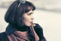 Sad beautiful fashion woman in leather coat outdoor Royalty Free Stock Photo