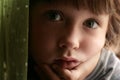 Sad, bored, daydreaming child Royalty Free Stock Photo