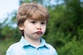 Sad boy. Emotional baby. Emotions on the face. Facial sadness. Emotional intelligence. Childrens frustration. The child Royalty Free Stock Photo