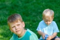 Sad boy in garden Royalty Free Stock Photo