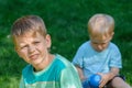 Sad boy in garden Royalty Free Stock Photo