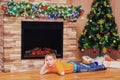 Sad boy in new year interior Royalty Free Stock Photo