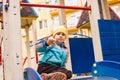 Sad boy play alone at playground outdoors Royalty Free Stock Photo